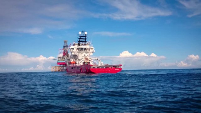 offshore vessel and drilling rig in the north sea