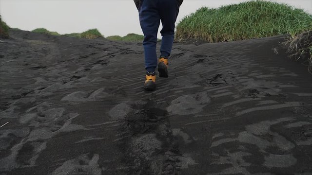 slow motion wlaking on black sand in iceland