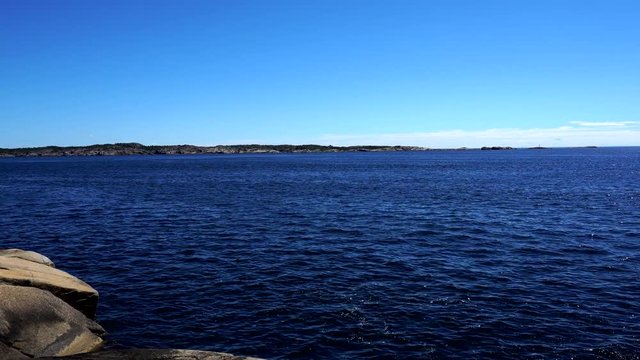 Panorama of Kjerringvik Norway with North Sea and sunny weather and blue sky.