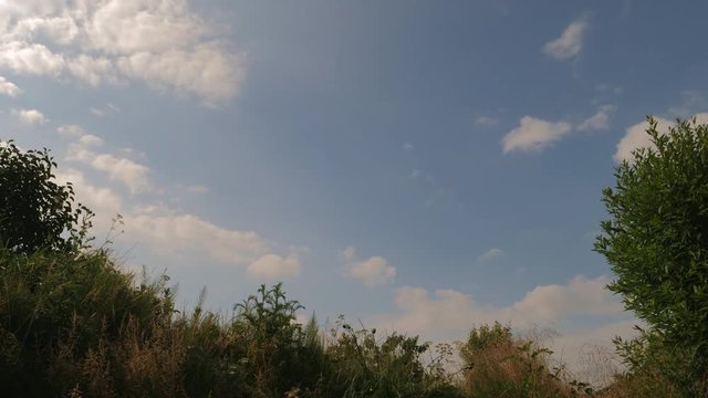 Timelapse on a windy day where cloud moves fast