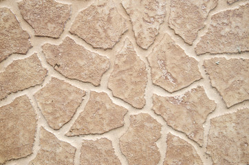 Brown ceramic tile imitating stones
