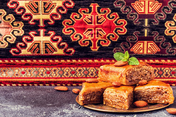 Homemade baklava with nuts and honey.