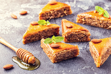 Homemade baklava with nuts and honey.