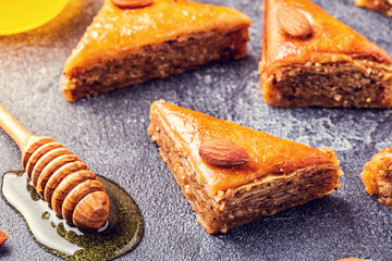 Homemade baklava with nuts and honey.