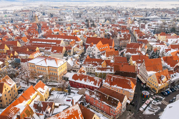 Fototapeta na wymiar Top view on winter panorama of medieval town within fortified wall. Romantic Road route, Nordlingen, Bavaria, Germany.