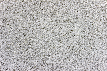 Texture of concrete wall. Plaster texture with small holes.