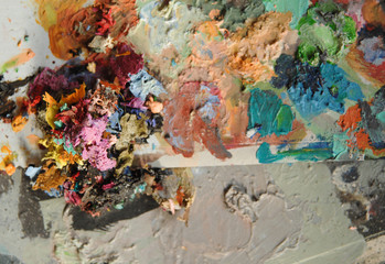 dried multi-colored paint. top view. concept: artistic and creative chaos