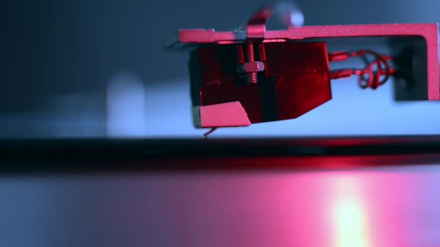 vintage vinyl turntable playing closeup footage with focus on stylus needle