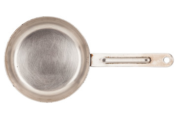 Old steel pan isolated on white background close-up, top view