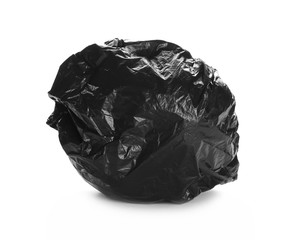 Crumpled plastic black garbage roll ball isolated on white background