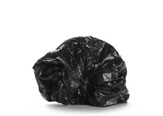 Crumpled plastic black garbage roll ball isolated on white background