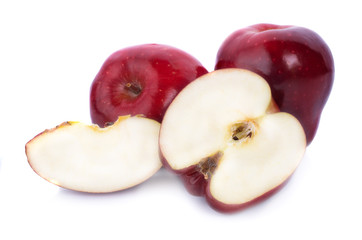 Red apple with drops isolated on white. background