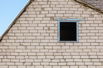 Obraz na płótnie Canvas Window in the wall made of bricks