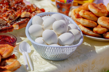 Boiled eggs in a dish on a table