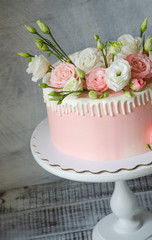 gentle pink cream cake with eustoma and dancing  girl