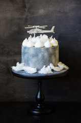 chocolate velvet silver cake with helicopter topper