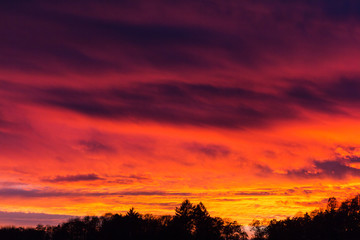 Dramatic sunset in an autumn dusk