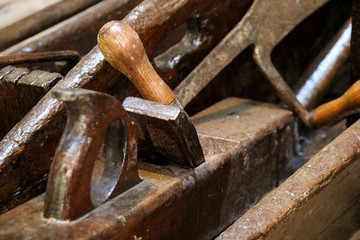 Old carpenter plane from a vintage workshop