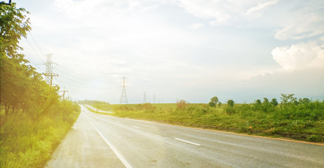 Fototapeta premium The natural power plant is surrounded by mountains.