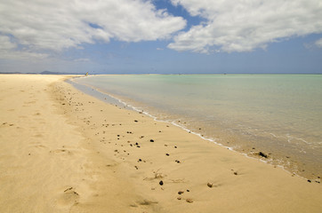 Clear tuquoise waters of Atlantic Ocean on Sotavento beach on Fuerteventura, Canary Islands