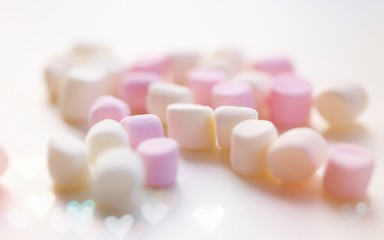 Christmas Holiday background with white and pink marshmallows