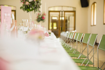 The wedding decor. The white flowers bouquet.