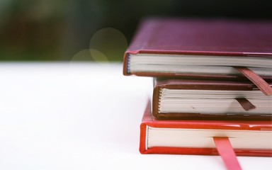 Pile of study books closeup on table blur background. concept of Education