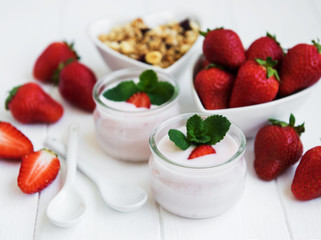 healthy breakfast, yogurt, fresh strawberries and granola