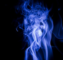 Blue smoke on black background