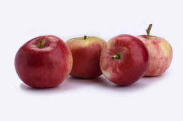 Fresh sweet red apples isolated on white background