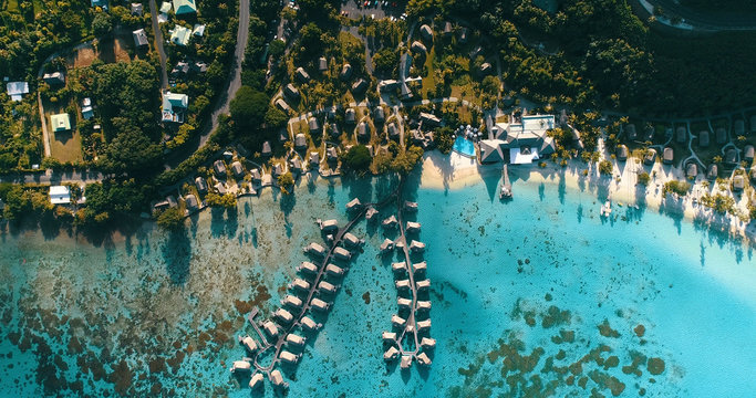 hotel with overwater bungalow in a lagoon in French Polynesia