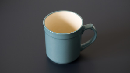 Blue Isolated empty mug on a grey table