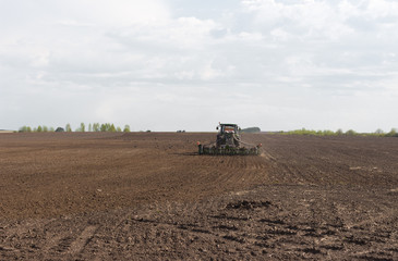 Fototapeta premium spring plowed field
