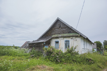 Old house on Hachin Island. Russia