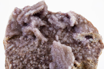 Natural Druse of amethyst on a white background