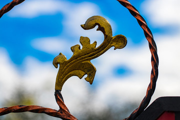 ornate wrought-iron elements of metal gate decoration