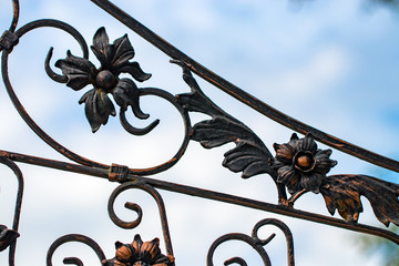 ornate wrought-iron elements of metal gate decoration