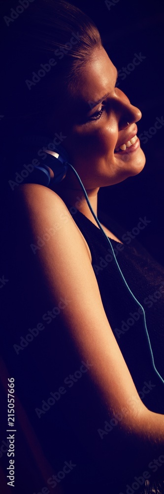 Poster side view of audio engineer using sound mixer