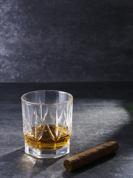 liquor in crystal glass and cigar
