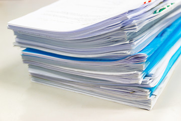 file folder and Stack of business report paper file on the table in a work office, concept document in work office