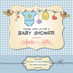 Baby shower card with baby clothings