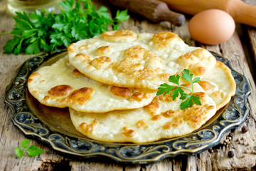 Fried flatbread flat bread piadina naan pita tortilla shelpek cheburek