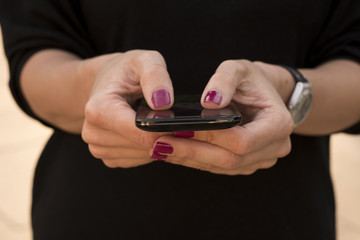 Close up of smart phone in hands