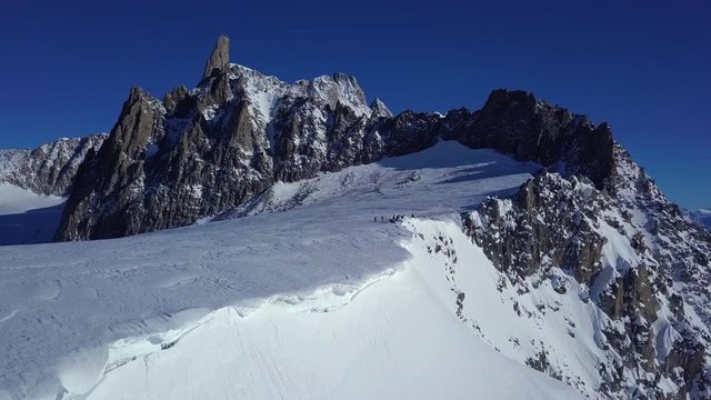 mountain from above with snow glacier drone shot