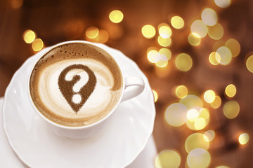 Coffee cup with question mark