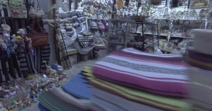 panning past shops in souvenir market or bazar