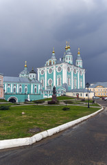 Fototapeta na wymiar Orthodox cathedral against a background of dark thunderclouds.