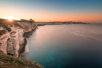 Sun rising over cliffs and Mediterranean at Bonifacio in Corsica