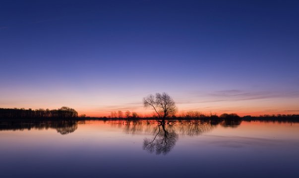 Flooded meadows at sunset, Wuemmewiesen Nature Reserve, Bremen, Germany, Europe