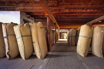 ZATEC TOWN,  CZECH REPUBLIC - August 25, 2017: Sacks of hops in historical storehouse in Zatec town.